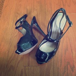 BCBGeneration Black Patent Strappy Heels
